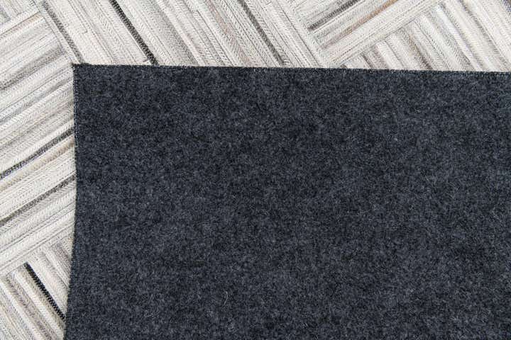 4' 11 x 8' 2 Cowhide Stocks Rug