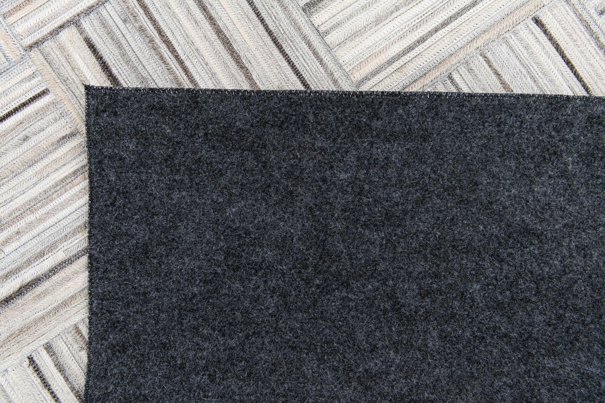 5' x 8' 2 Cowhide Stocks Rug