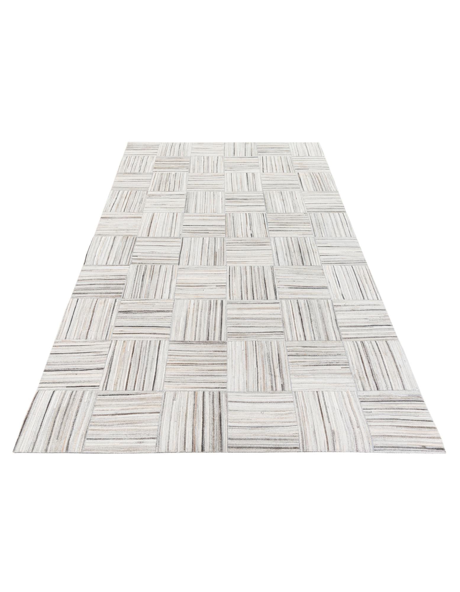 4' 11 x 8' 2 Cowhide Stocks Rug
