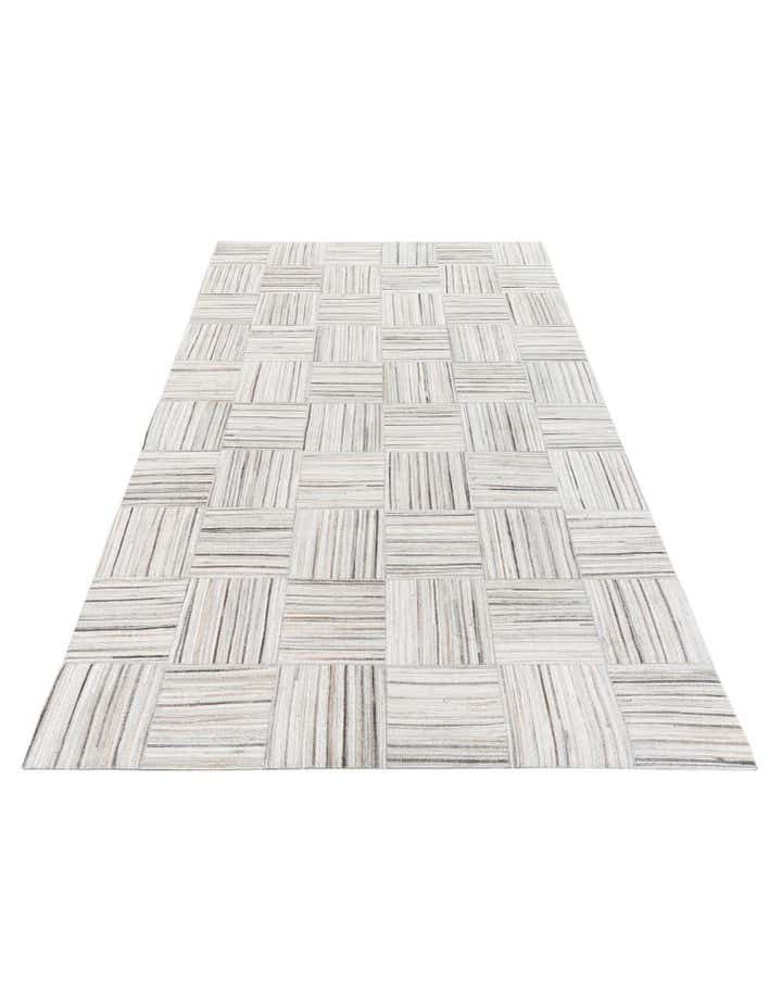 4' 11 x 8' 2 Cowhide Stocks Rug
