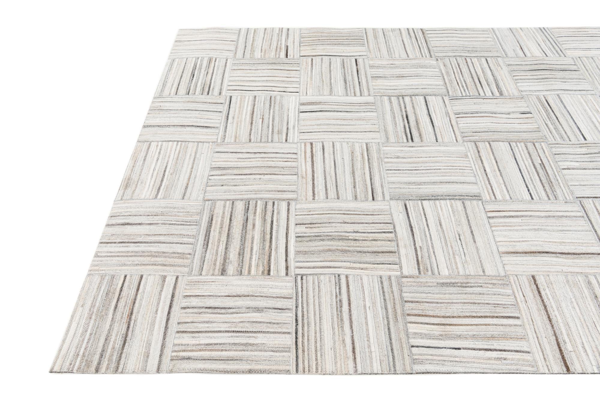 4' 11 x 8' 2 Cowhide Stocks Rug