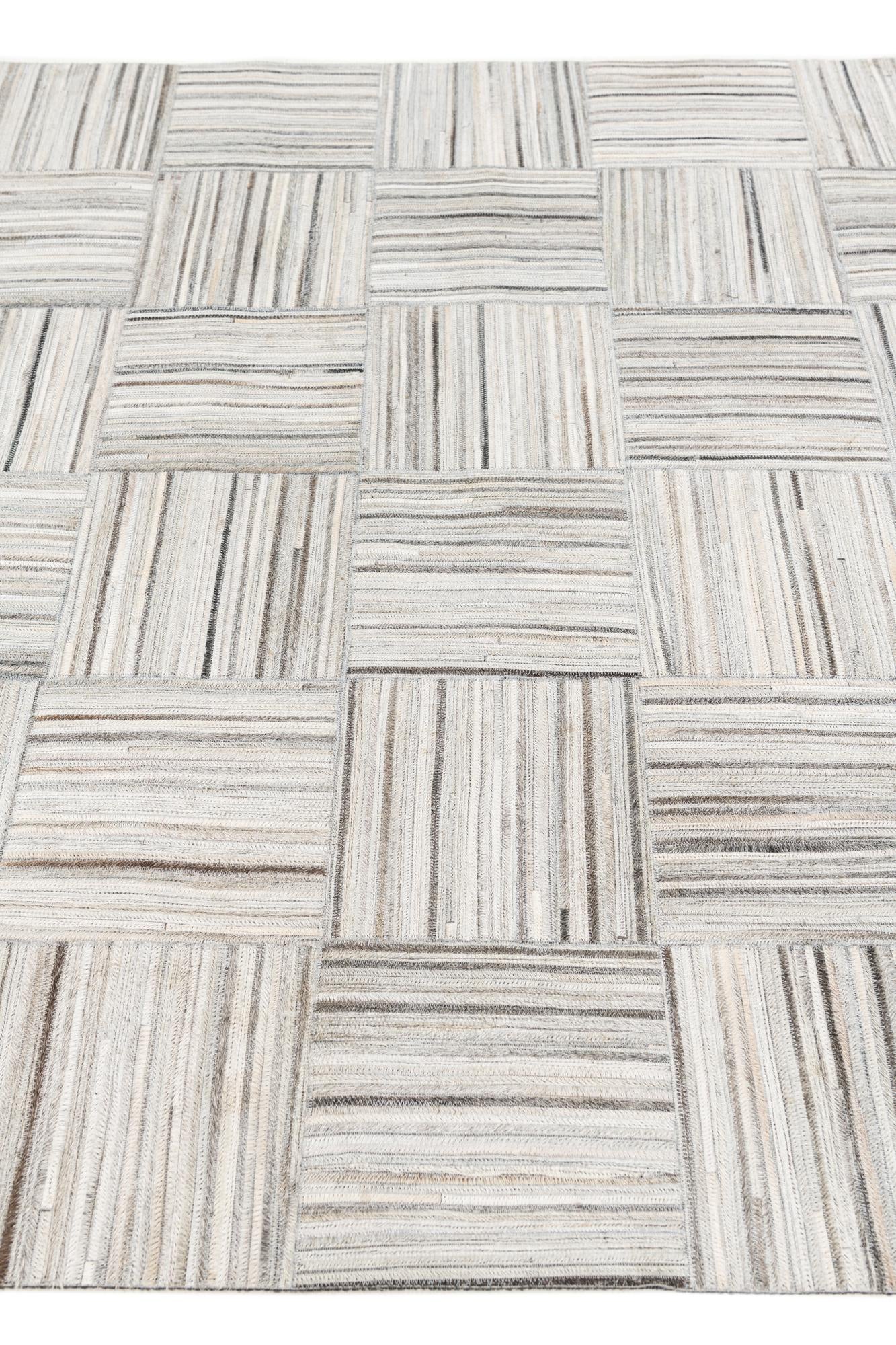 4' 11 x 8' 2 Cowhide Stocks Rug