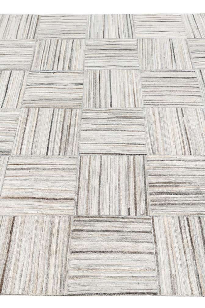 4' 11 x 8' 2 Cowhide Stocks Rug