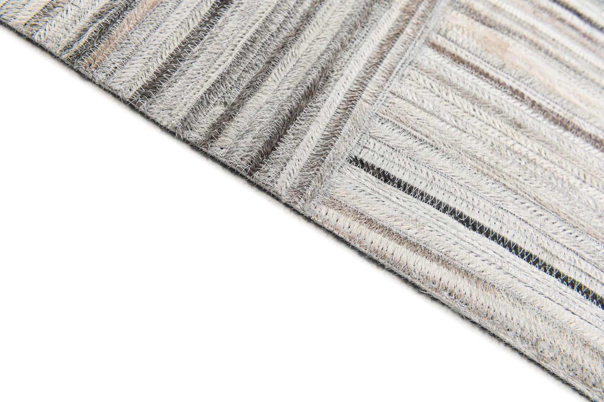 4' 11 x 8' 2 Cowhide Stocks Rug