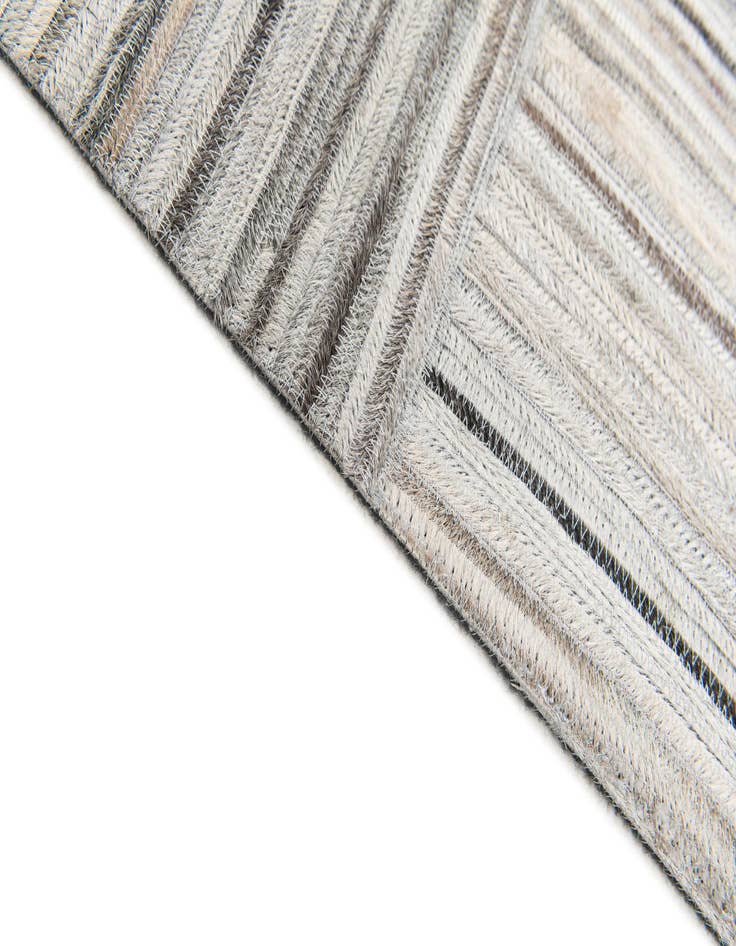 Detail image of 4' 11 x 8' 2 Cowhide Stocks Rug