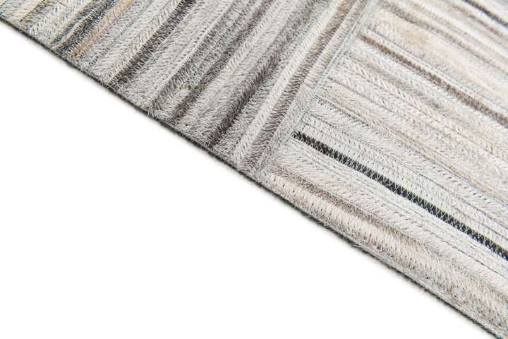 4' 11 x 8' 2 Cowhide Stocks Rug