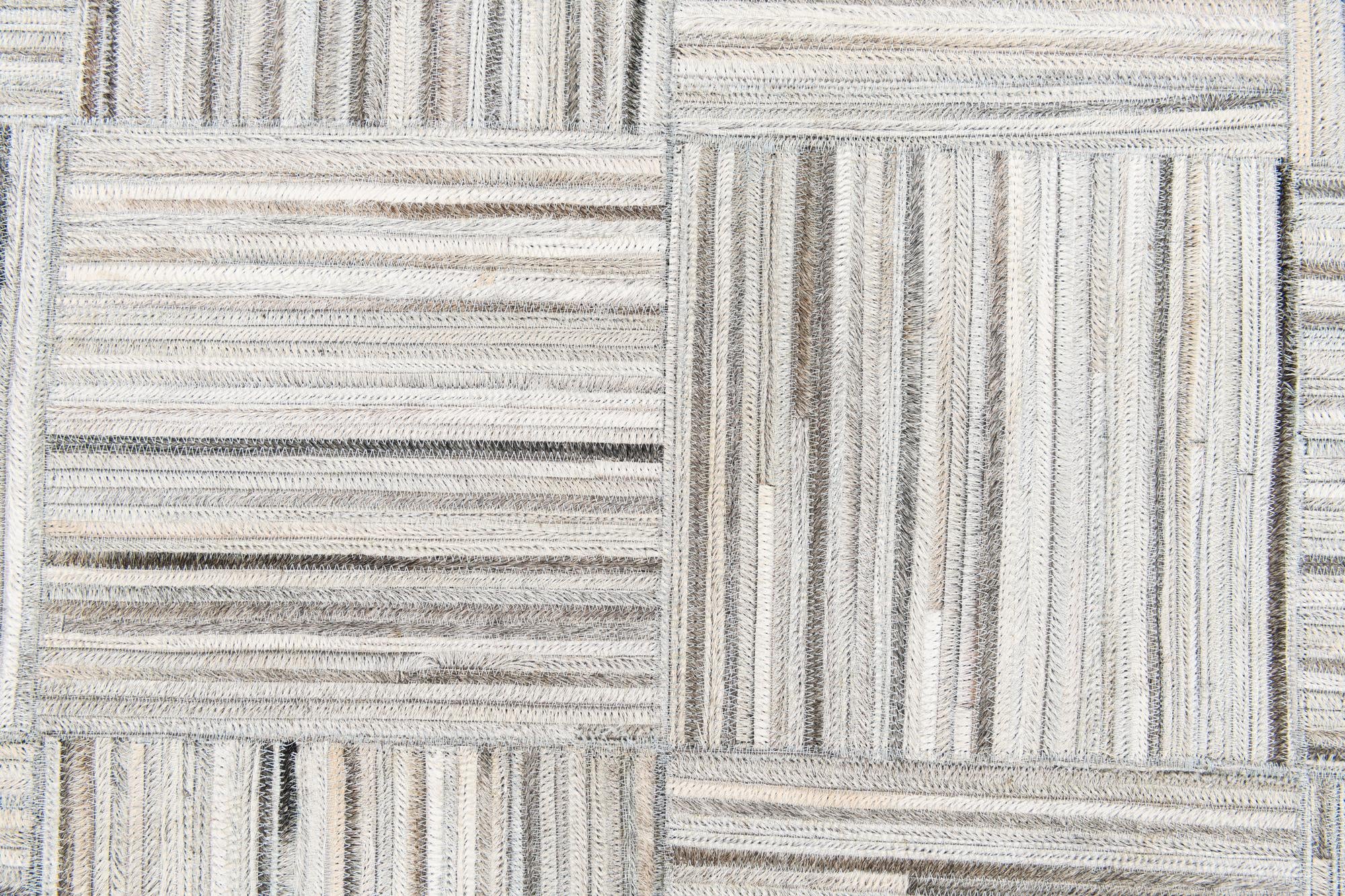 4' 11 x 8' 2 Cowhide Stocks Rug
