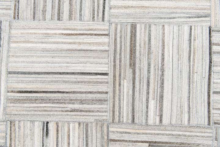 4' 11 x 8' 2 Cowhide Stocks Rug