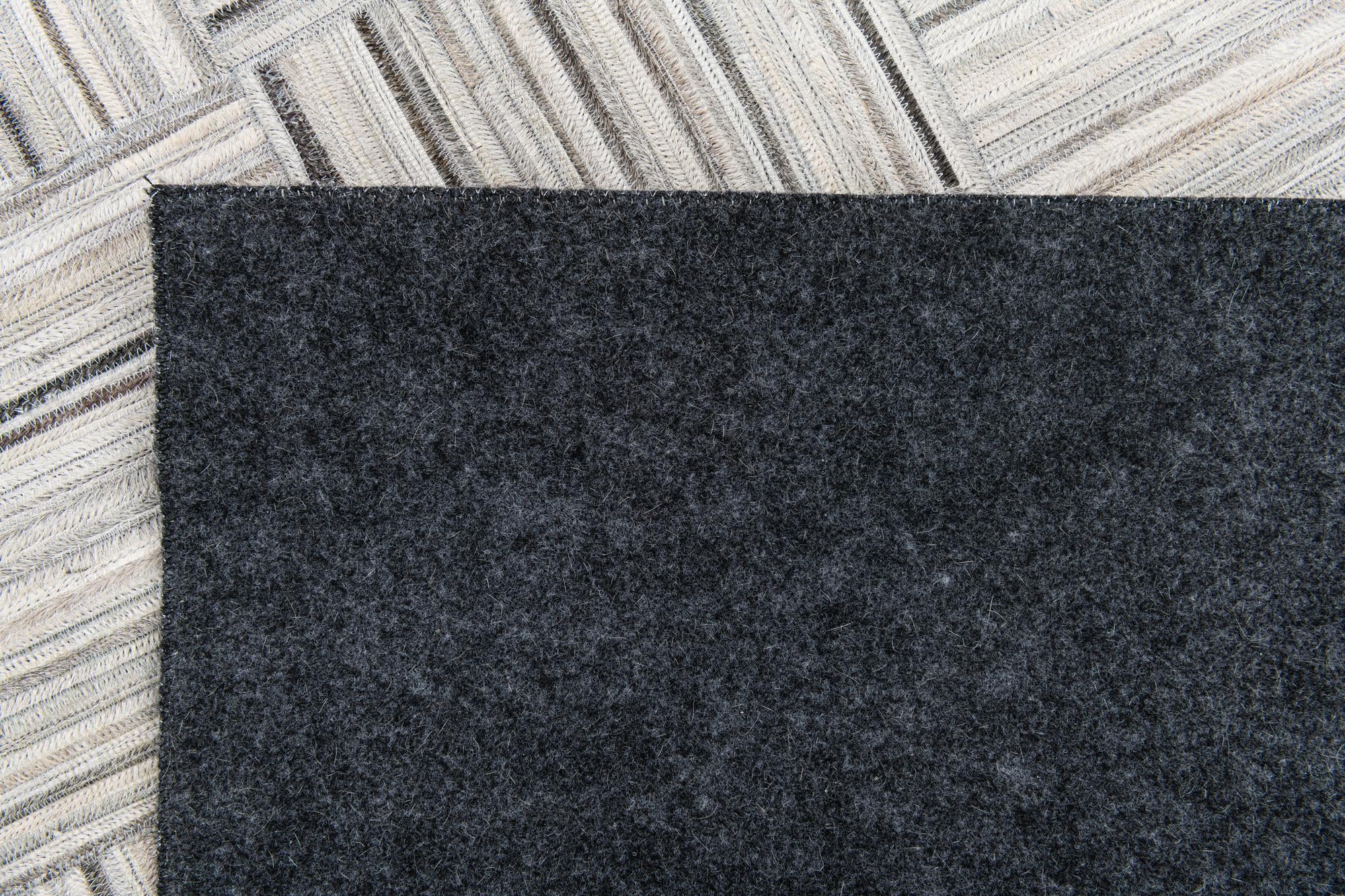 4' 11 x 8' 2 Cowhide Stocks Rug