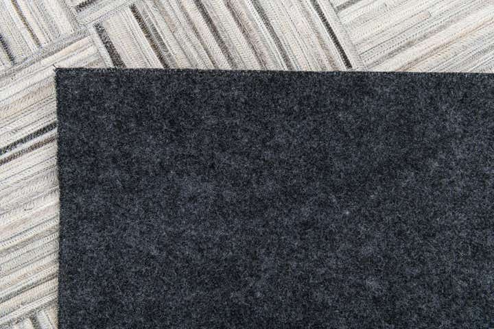 4' 11 x 8' 2 Cowhide Stocks Rug