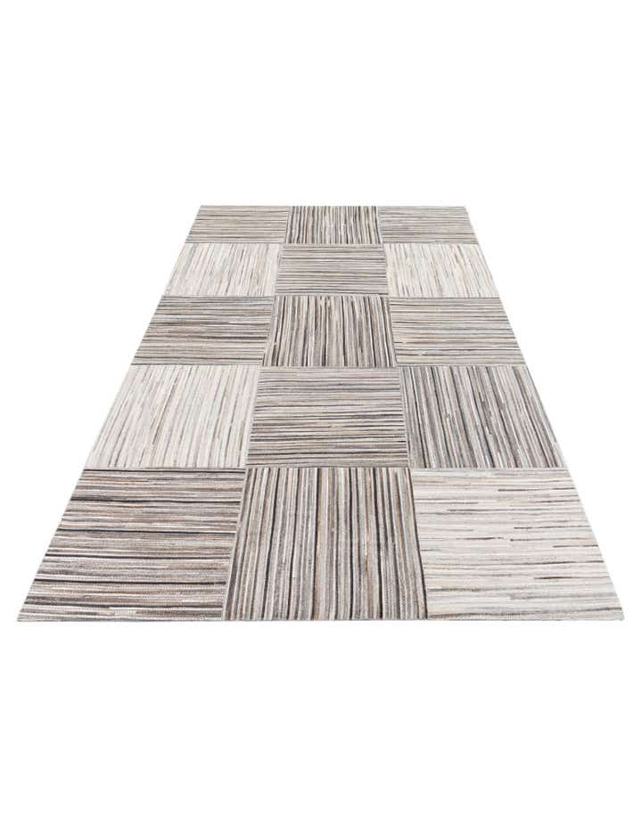 4' 11 x 8' 1 Cowhide Stocks Rug