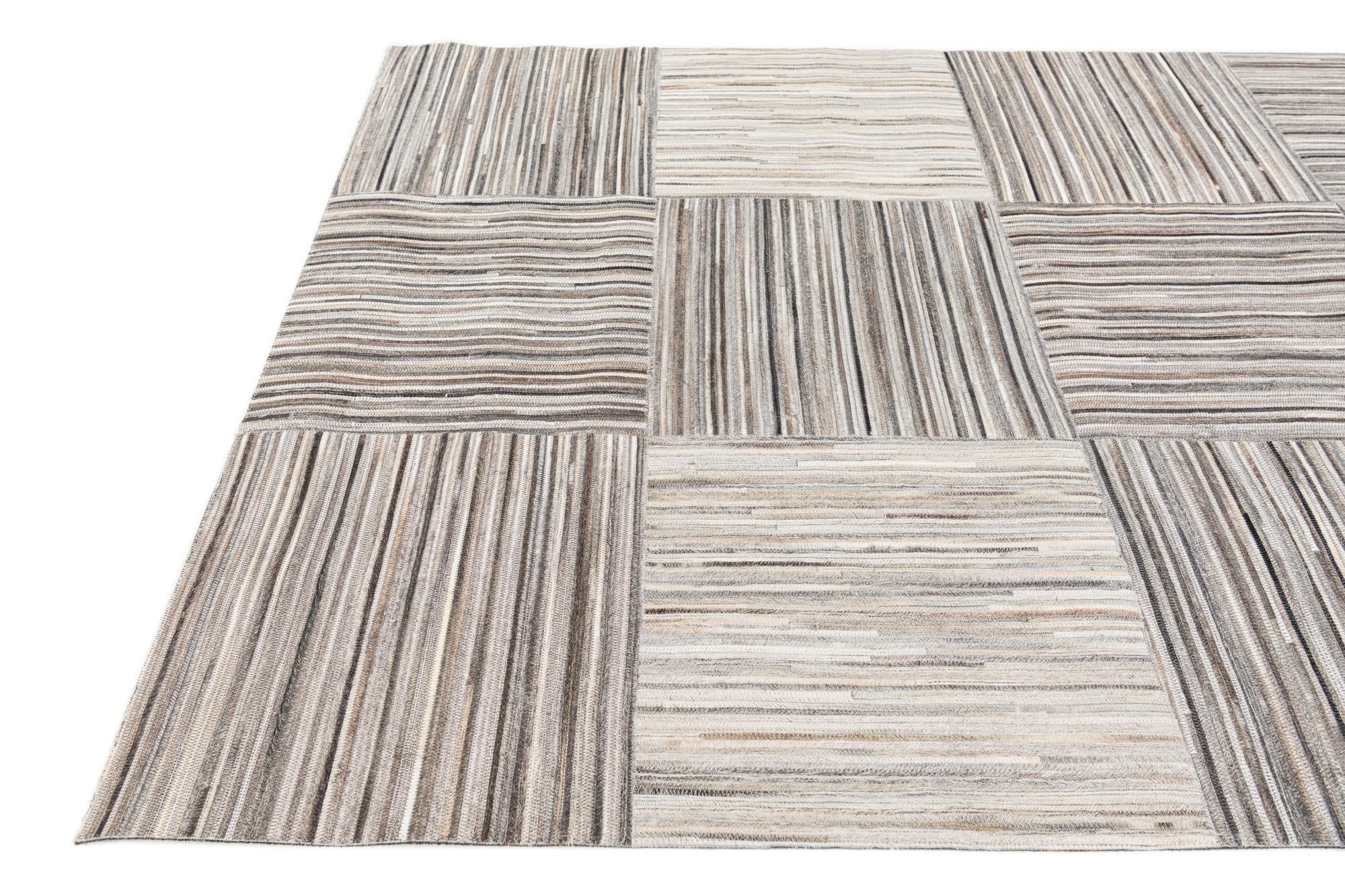 4' 11 x 8' 1 Cowhide Stocks Rug