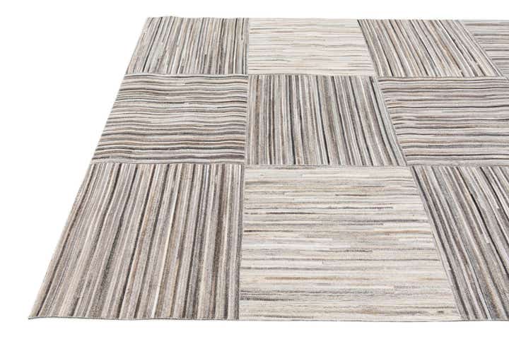 4' 11 x 8' 1 Cowhide Stocks Rug