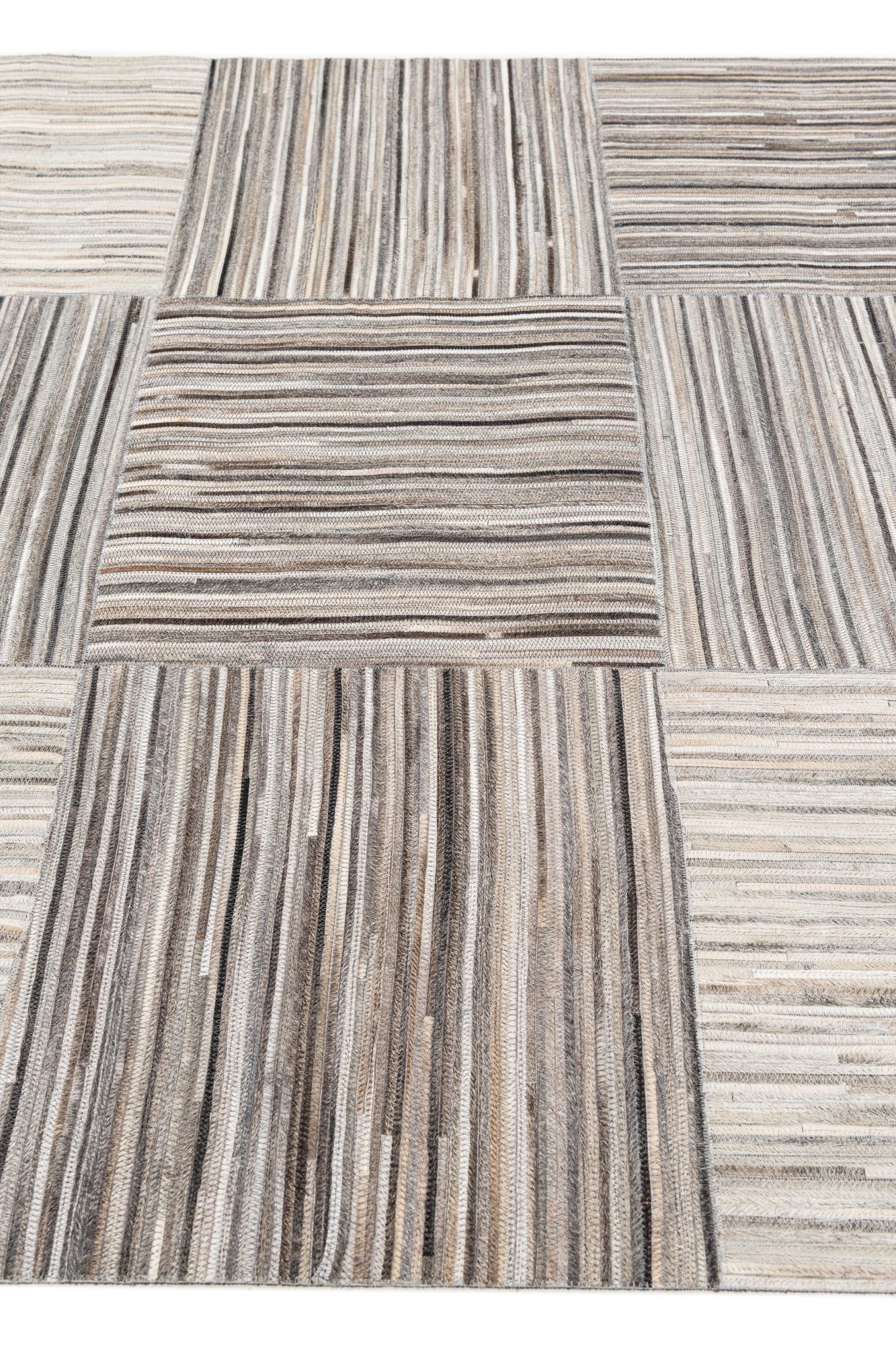 4' 11 x 8' 1 Cowhide Stocks Rug