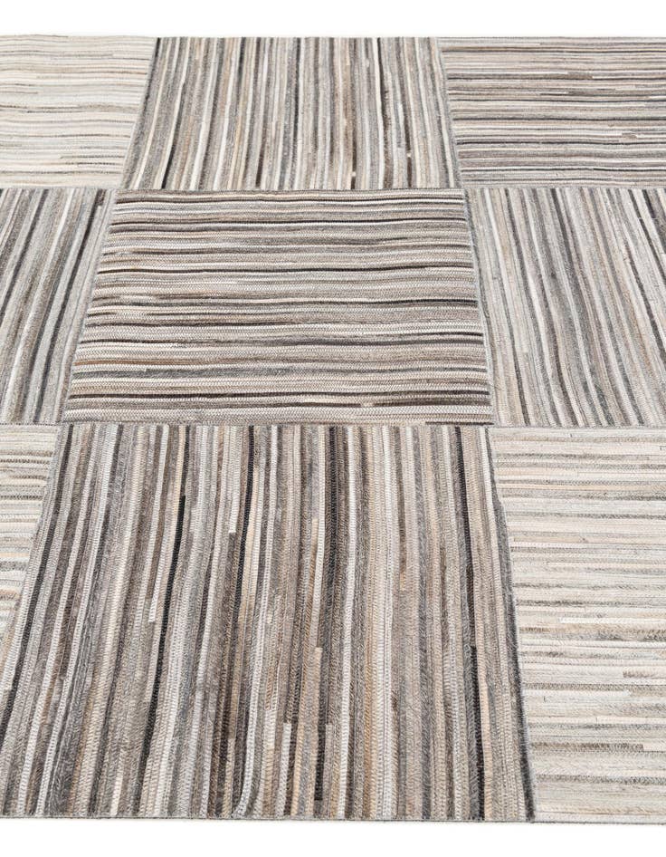 Detail image of 4' 11 x 8' 1 Cowhide Stocks Rug