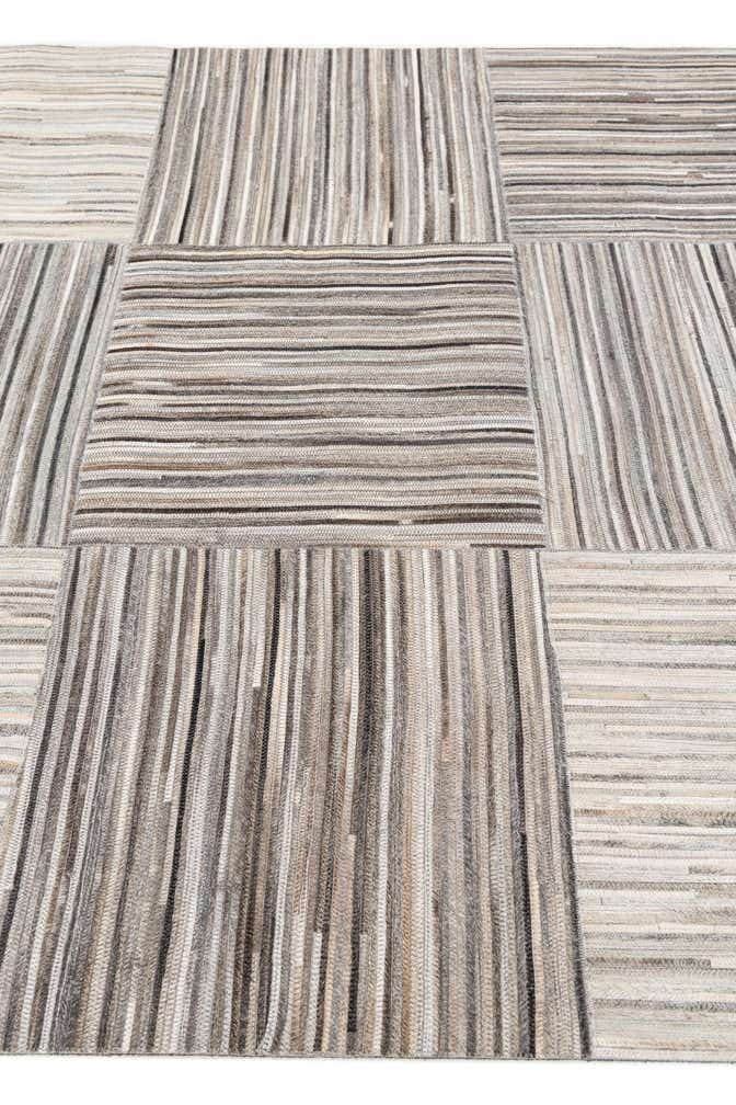 4' 11 x 8' 1 Cowhide Stocks Rug