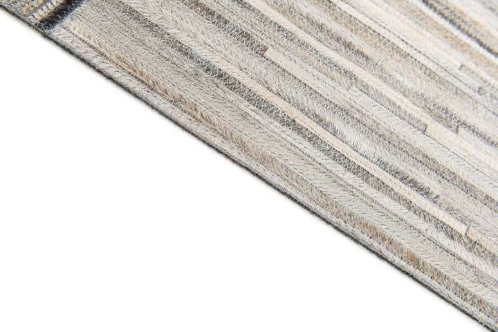 4' 11 x 8' 1 Cowhide Stocks Rug