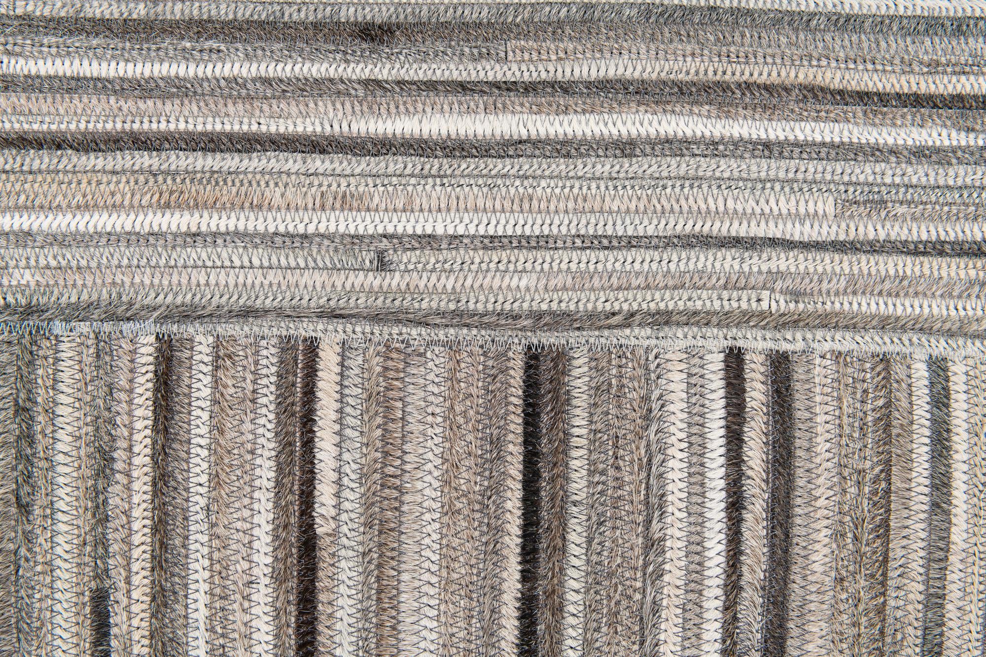 4' 11 x 8' 1 Cowhide Stocks Rug