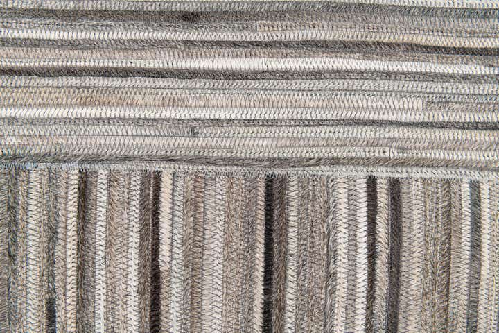 4' 11 x 8' 1 Cowhide Stocks Rug