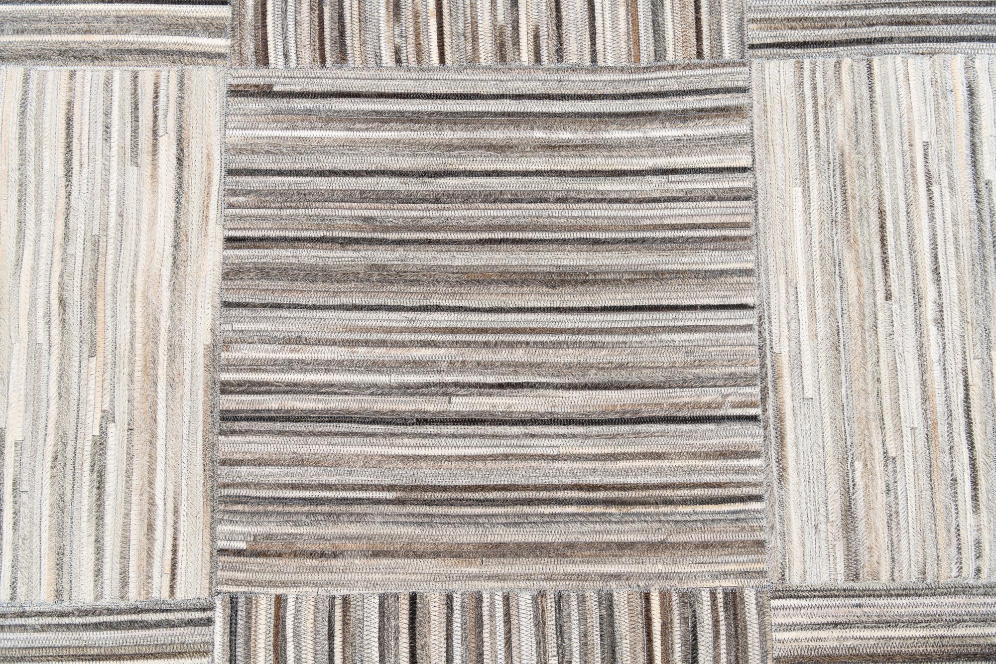 4' 11 x 8' 1 Cowhide Stocks Rug