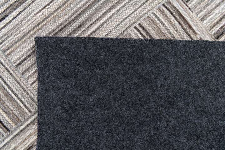 4' 11 x 8' 1 Cowhide Stocks Rug