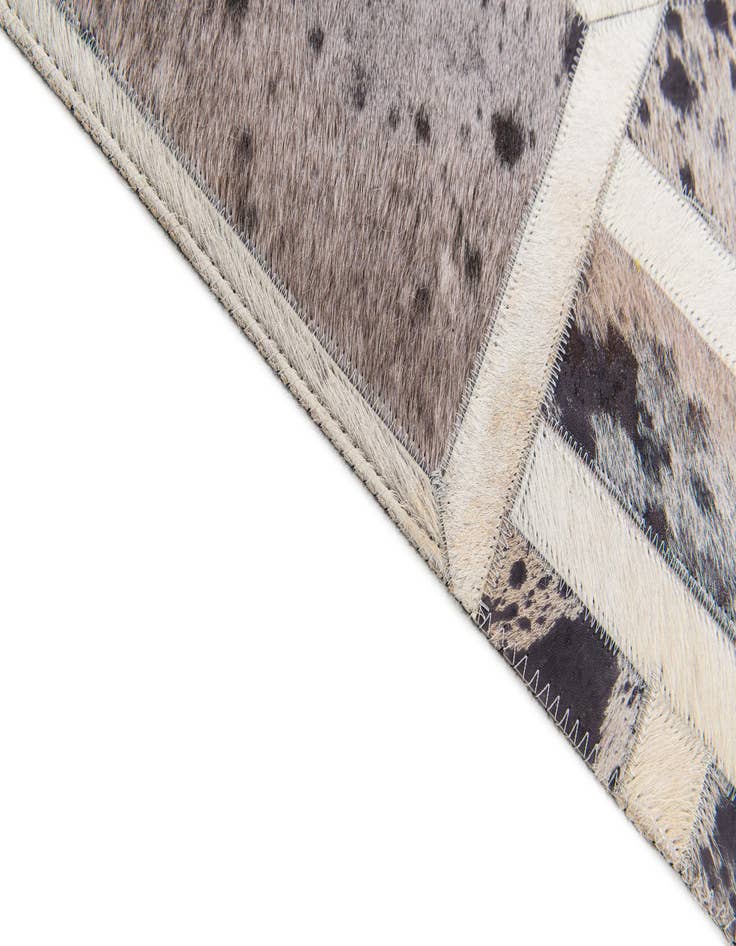 Detail image of 4' 11 x 8' Cowhide Stocks Rug