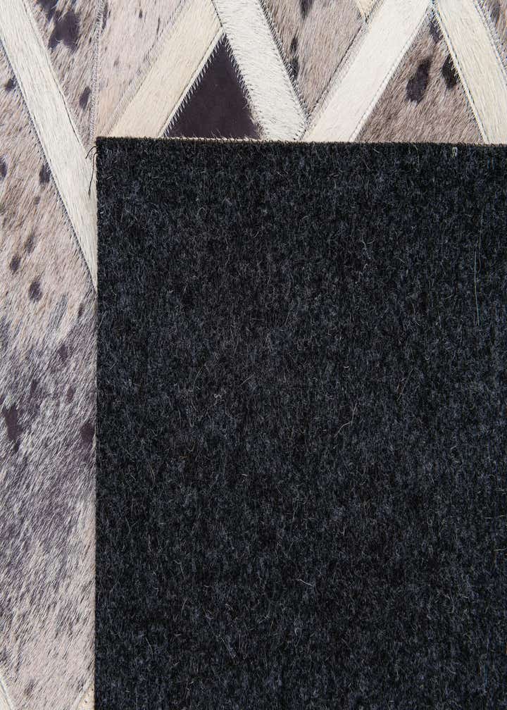 4' 11 x 8' Cowhide Stocks Rug