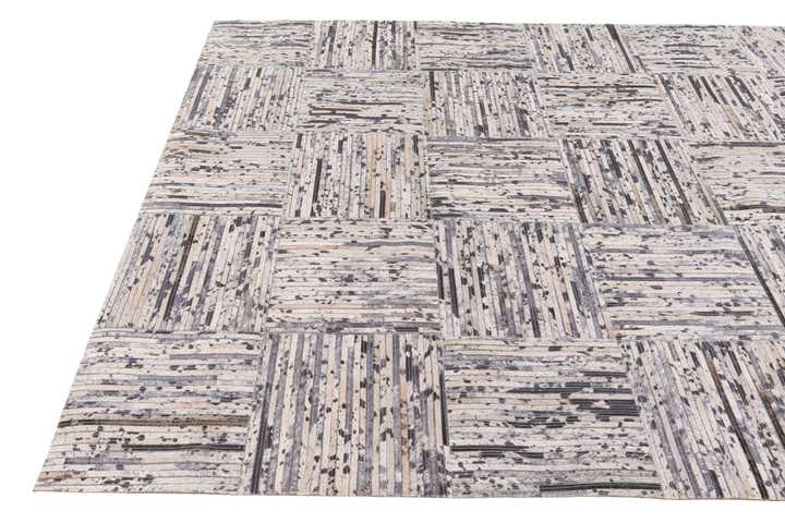 4' 11 x 7' 10 Cowhide Stocks Rug