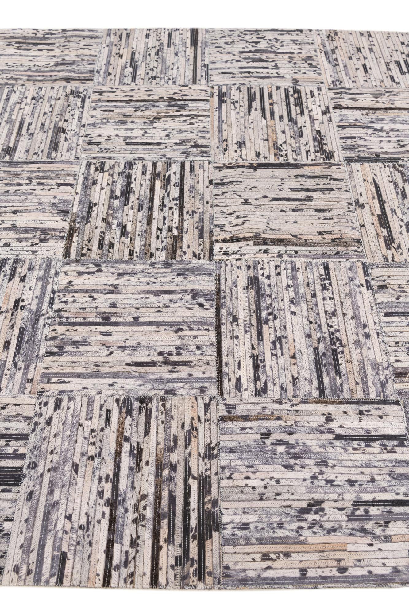 4' 11 x 7' 10 Cowhide Stocks Rug