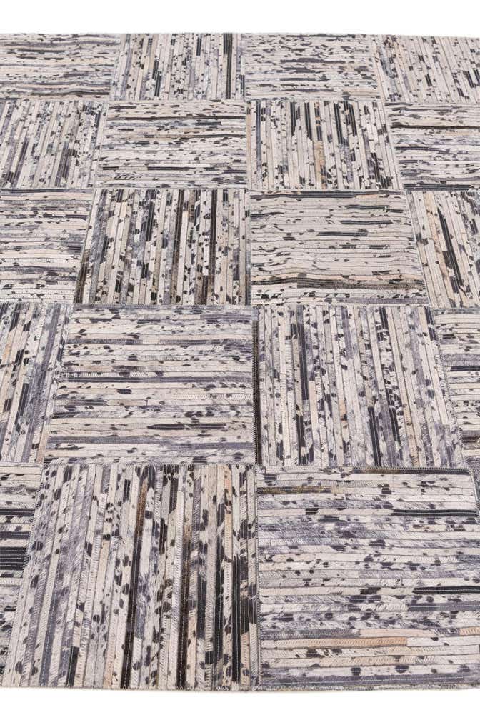 4' 11 x 7' 10 Cowhide Stocks Rug