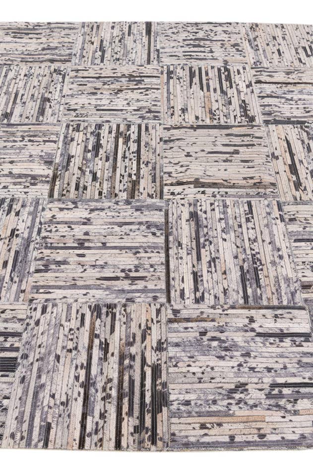 Detail image of 4' 11 x 7' 10 Cowhide Stocks Rug