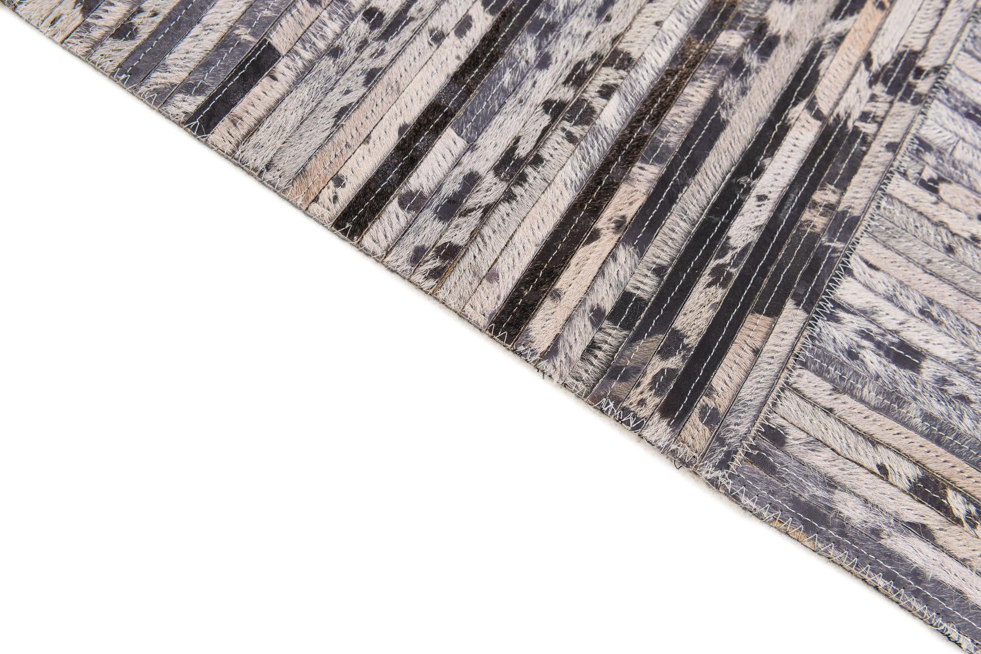 4' 11 x 7' 10 Cowhide Stocks Rug