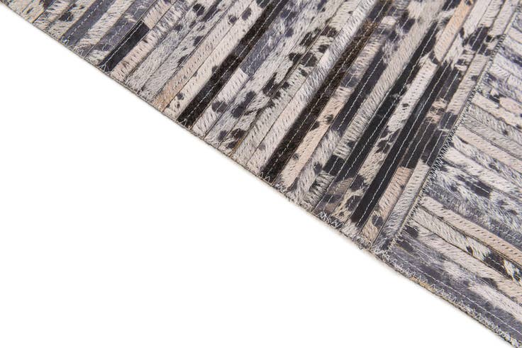 Detail image of 4' 11 x 7' 10 Cowhide Stocks Rug
