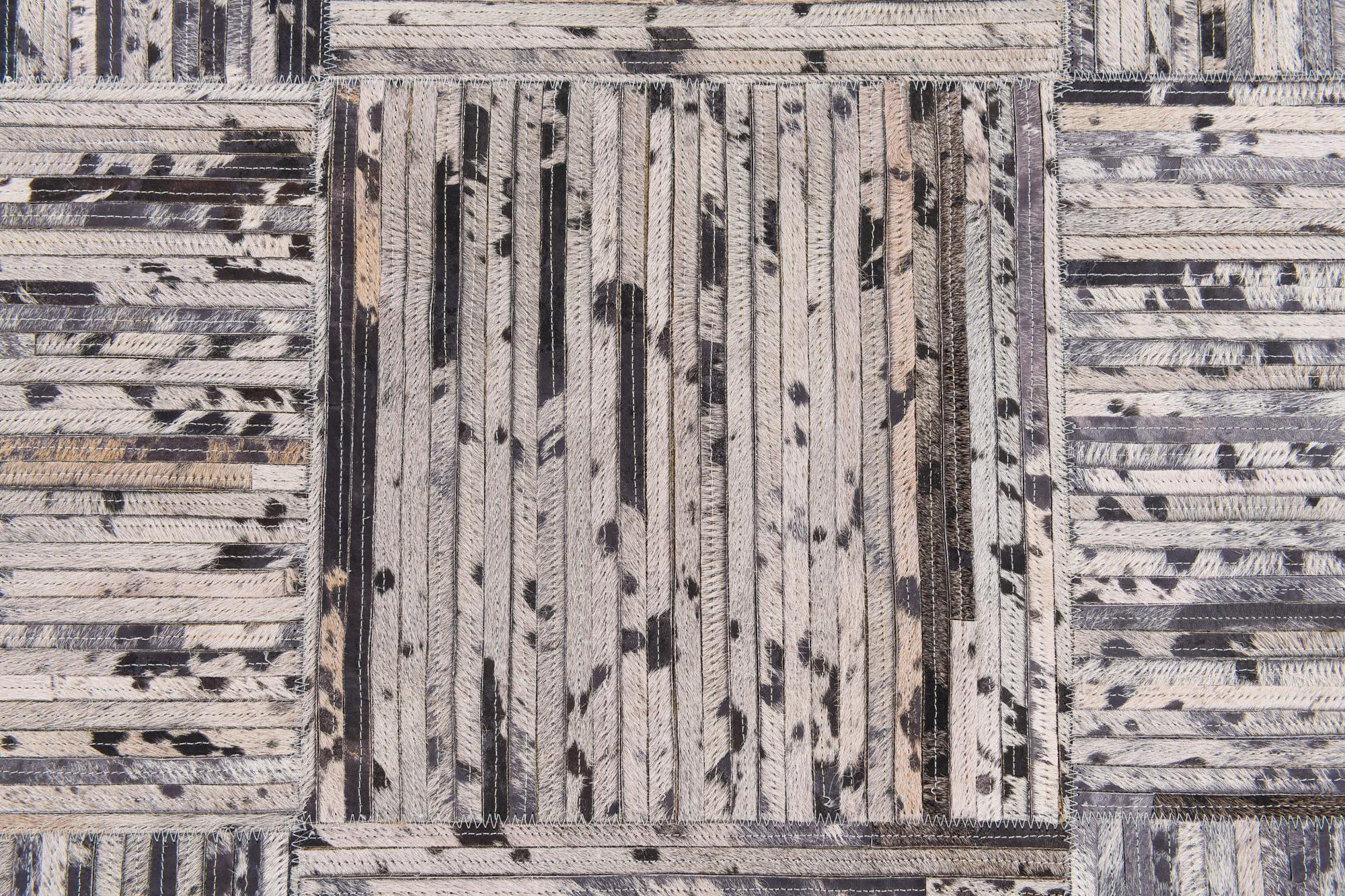 4' 11 x 7' 10 Cowhide Stocks Rug