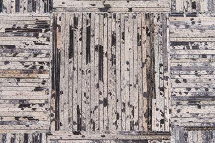 4' 11 x 7' 10 Cowhide Stocks Rug