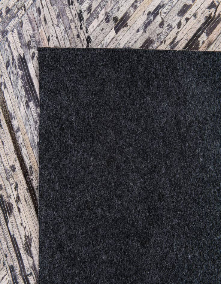 Detail image of 4' 11 x 7' 10 Cowhide Stocks Rug