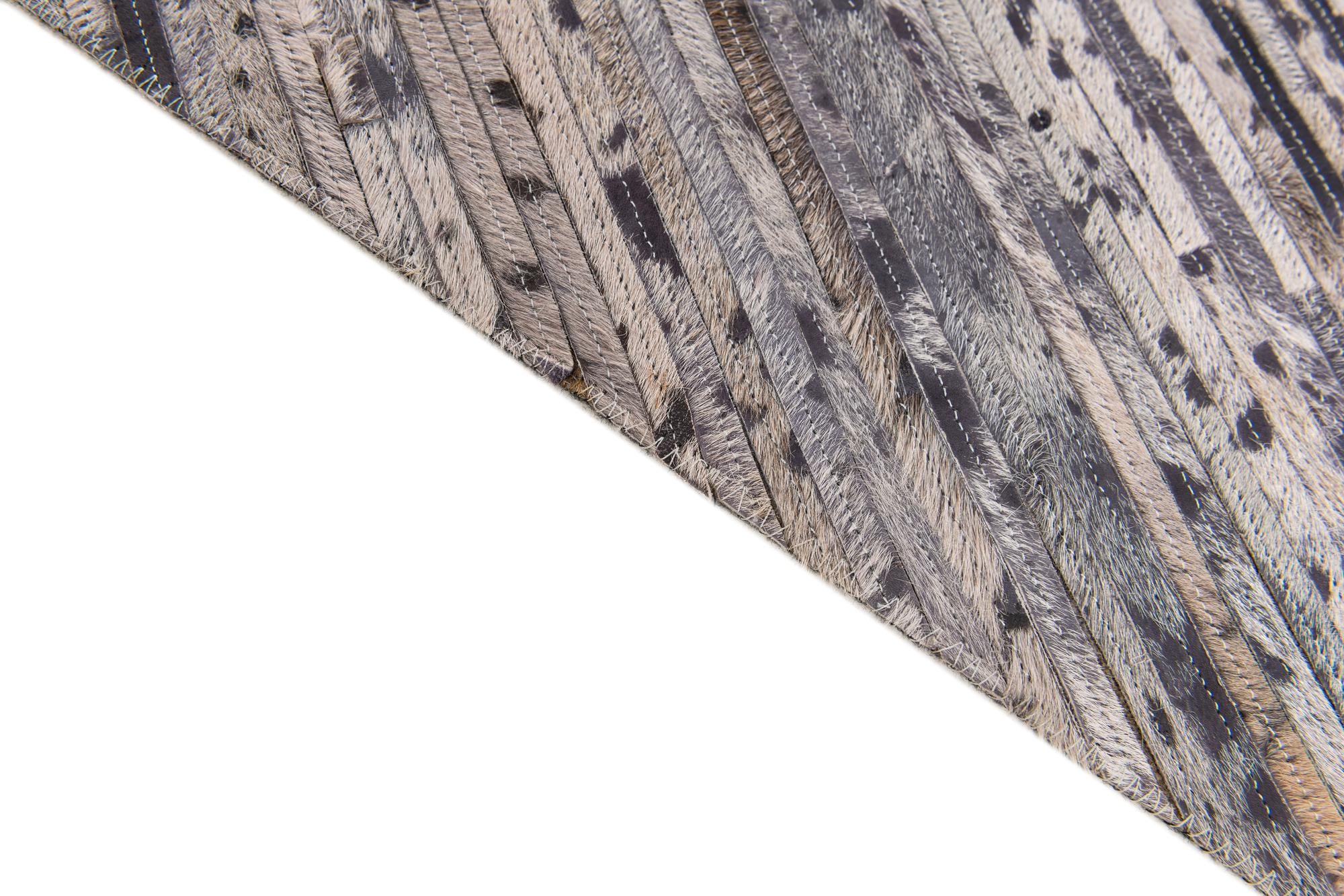 5' x 8' Cowhide Stocks Rug