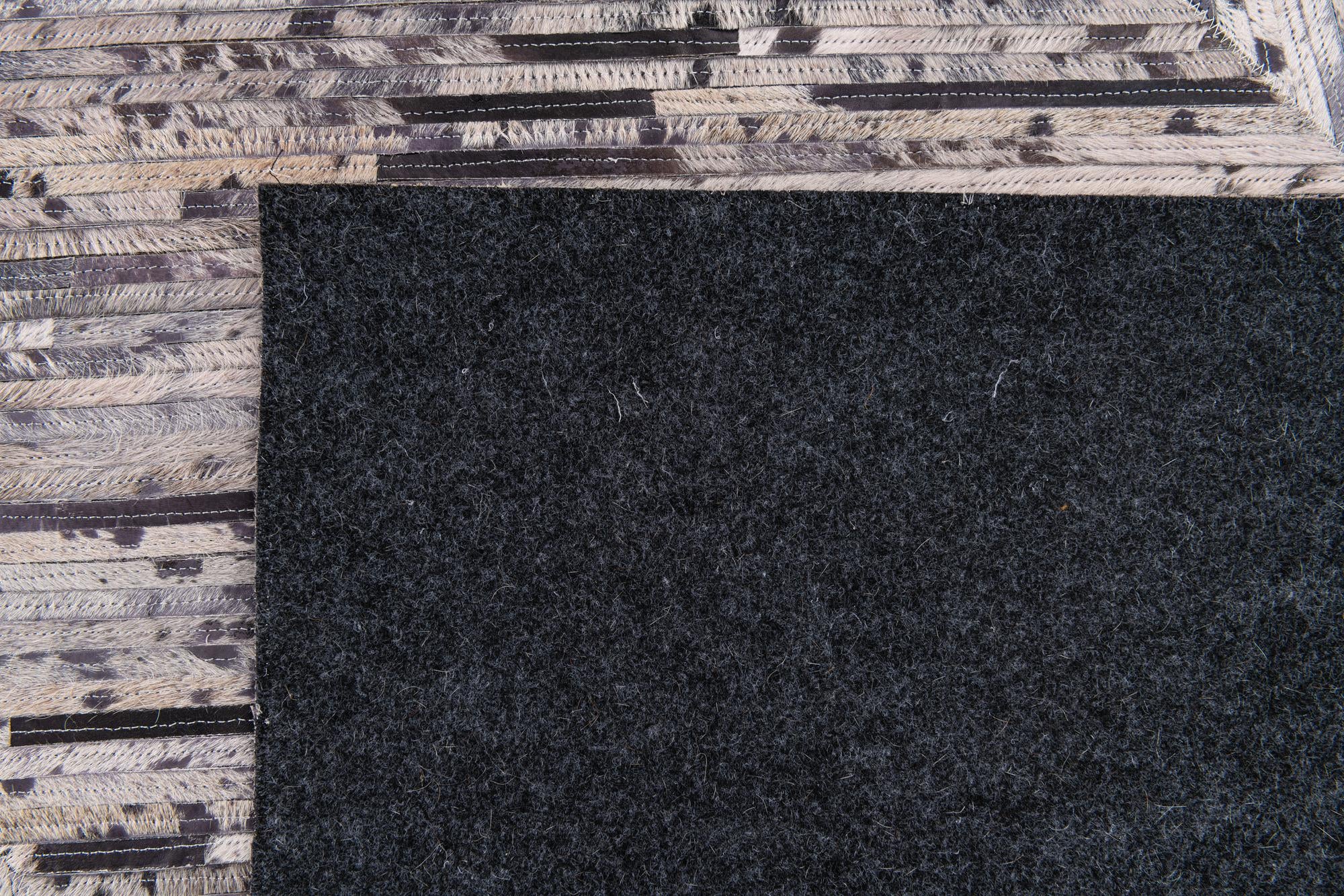 5' x 8' Cowhide Stocks Rug