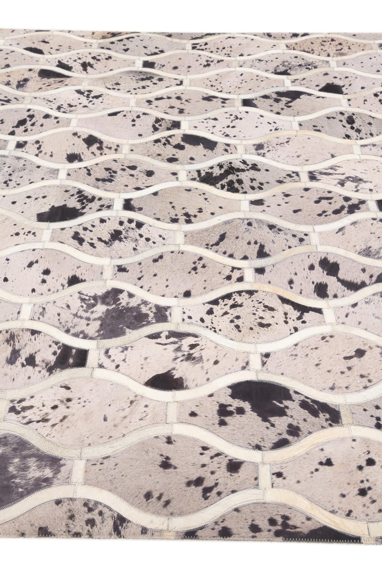 4' 11 x 7' 9 Cowhide Stocks Rug