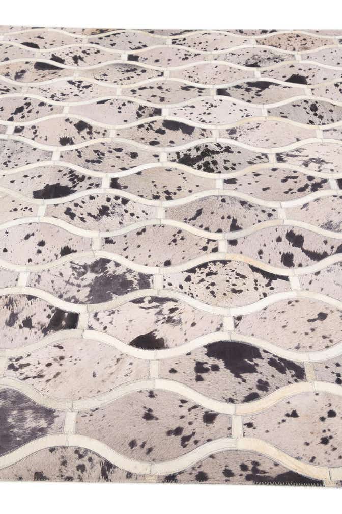 4' 11 x 7' 9 Cowhide Stocks Rug