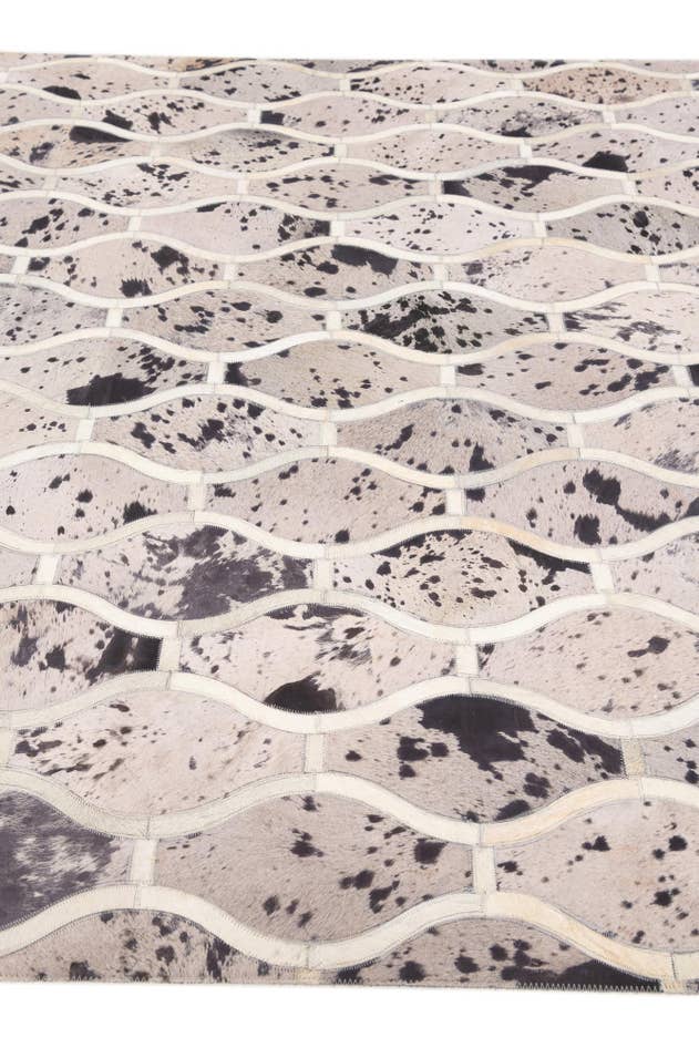 Detail image of 4' 11 x 7' 9 Cowhide Stocks Rug