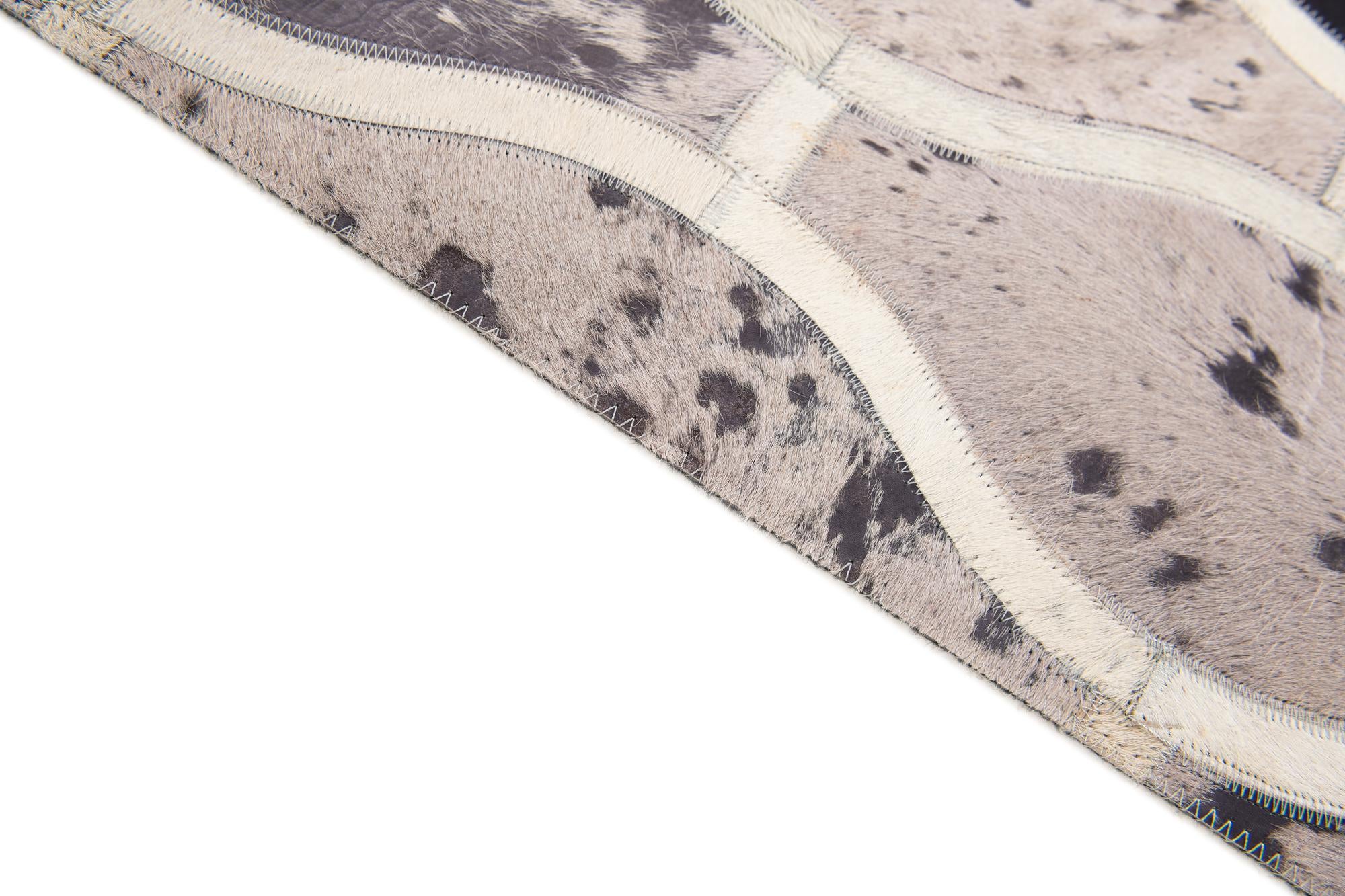4' 11 x 7' 9 Cowhide Stocks Rug