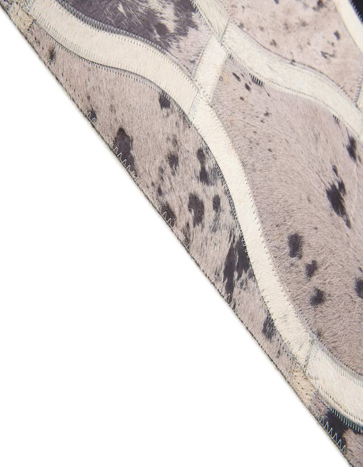 Detail image of 4' 11 x 7' 9 Cowhide Stocks Rug