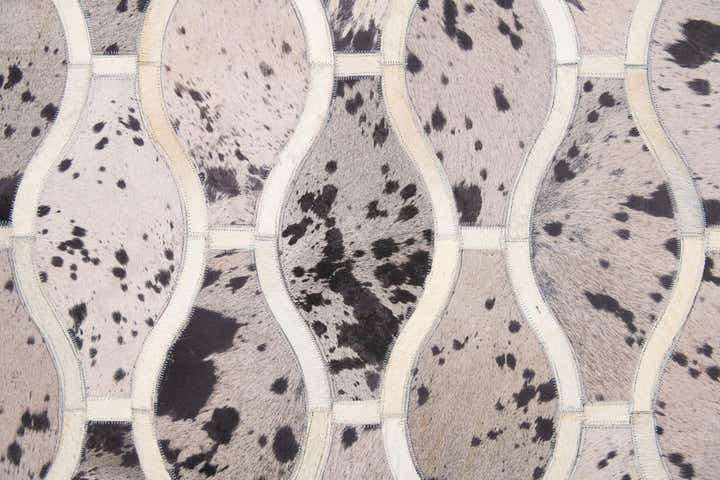 4' 11 x 7' 9 Cowhide Stocks Rug