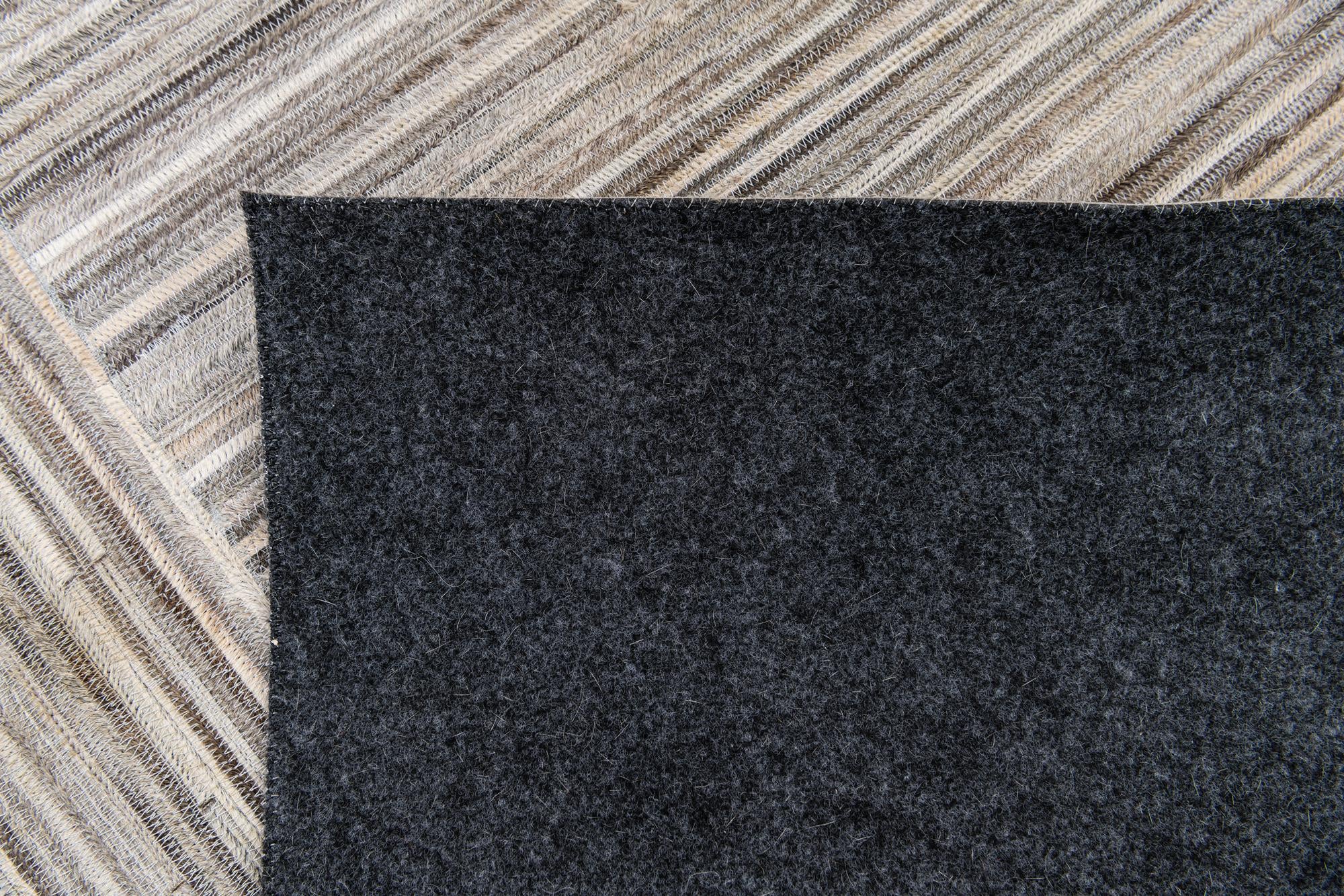 5' x 8' 3 Cowhide Stocks Rug