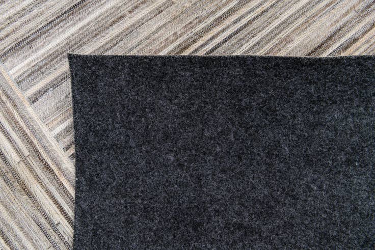 Detail image of 5' x 8' 3 Cowhide Stocks Rug