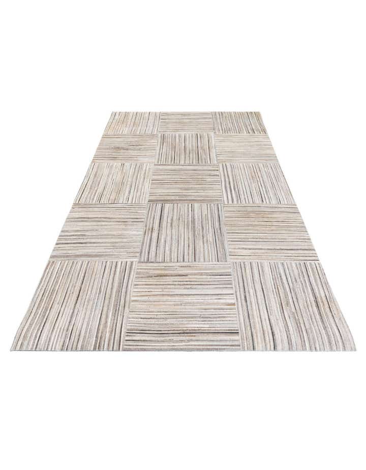 4' 11 x 8' 2 Cowhide Stocks Rug