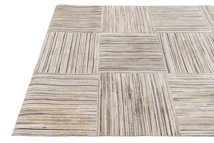 Detail image of 4' 11 x 8' 2 Cowhide Stocks Rug