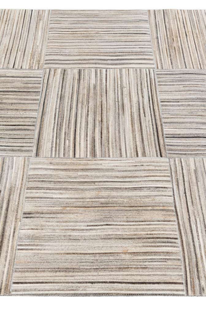 4' 11 x 8' 2 Cowhide Stocks Rug