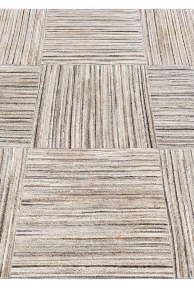 Detail image of 4' 11 x 8' 2 Cowhide Stocks Rug